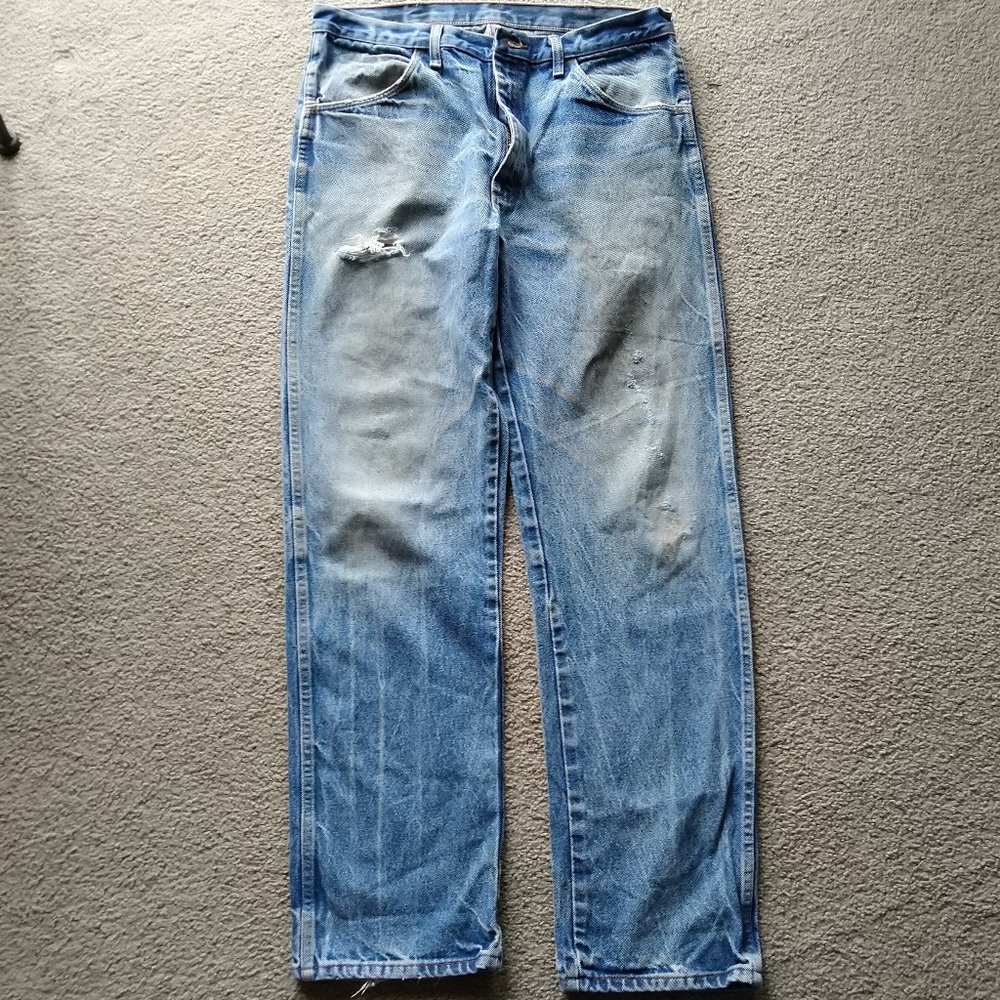 Vintage naturally distressed Rustler denim jeans